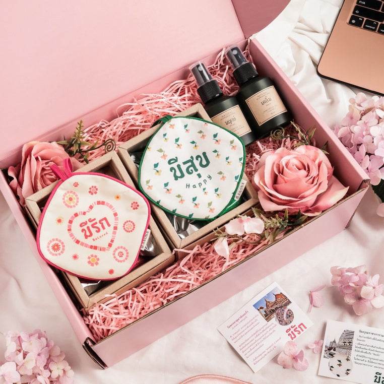 One-Sake.com wedding gift set for newlyweds with scented sprays and floral decorative items in a pink box