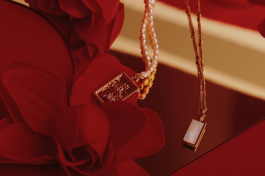 a close up of a necklace on a table