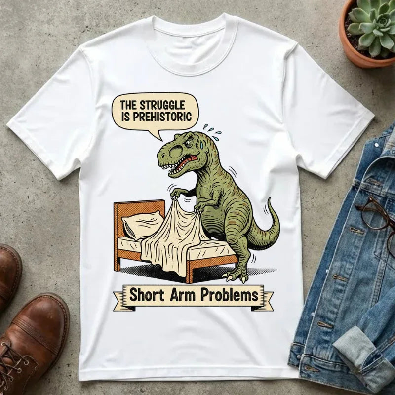 Funny T-Rex Shirt - "The Struggle Is Prehistoric" Graphic Tee - Short Arm Problems Meme Tshirt - Vintage Dinosaur Humorous Gift for Him & Her - Retro Comic Style Top