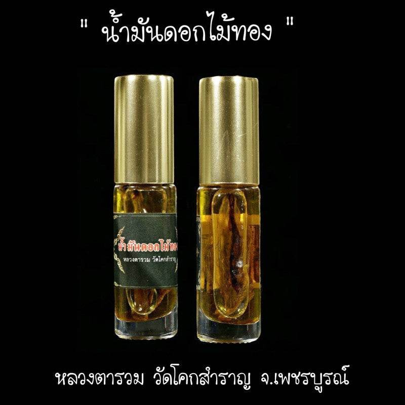 Golden Flower Oil – Seductive Prosperity Elixir By Luangta Ruam, Wat Khok Samran Temple, Phetchabun, Thailand 金色花油 • 魅力與財富兼具的祕法香油 - Thai Blessing Co
