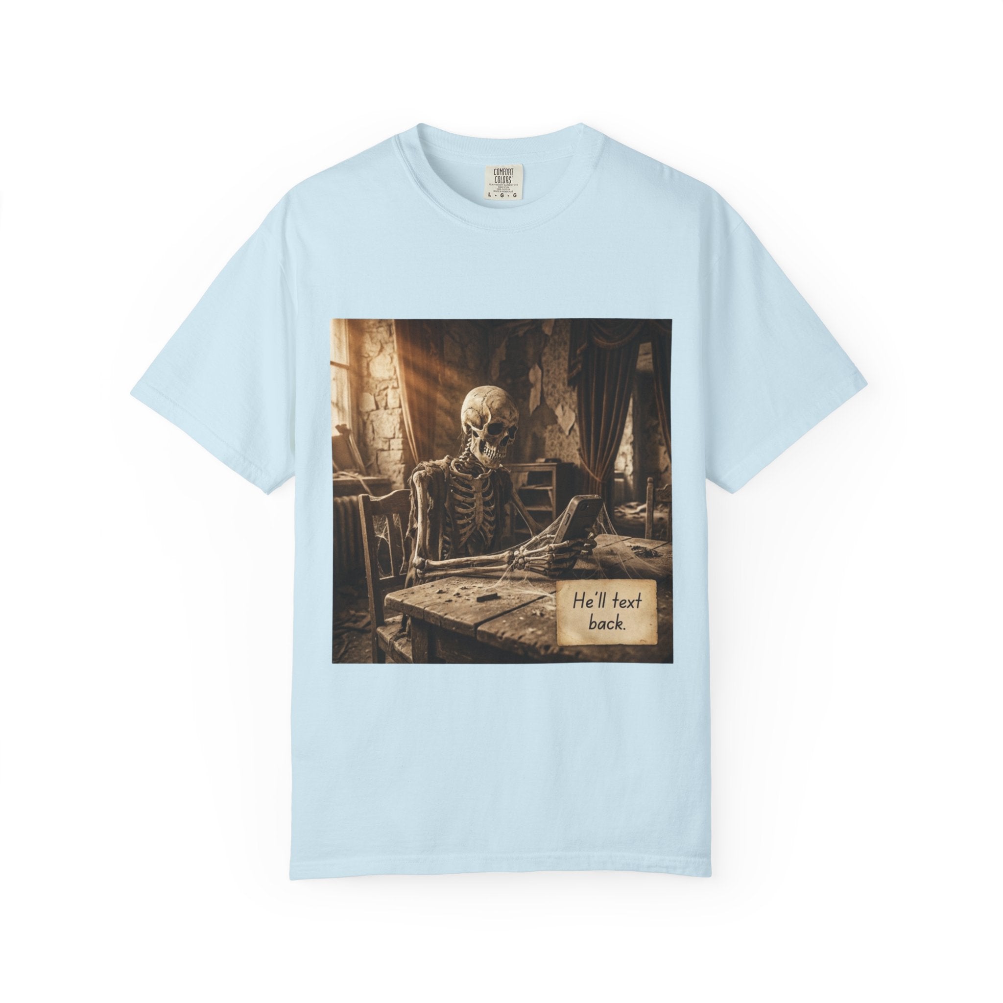 He’ll Text Back Skeleton T-Shirt — Funny Waiting Halloween Tee Chambray
