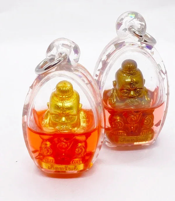 Kuman Dut Rok Amulet - Attract Wealth and Prosperity with Ajarn Nanboon's Spirit Child