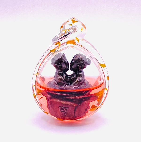 Inn-Koo Saen Ha Amulet for Love & Charm by Ajarn Nong - Empower Your Heart with this Powerful Amulet Stone bowl