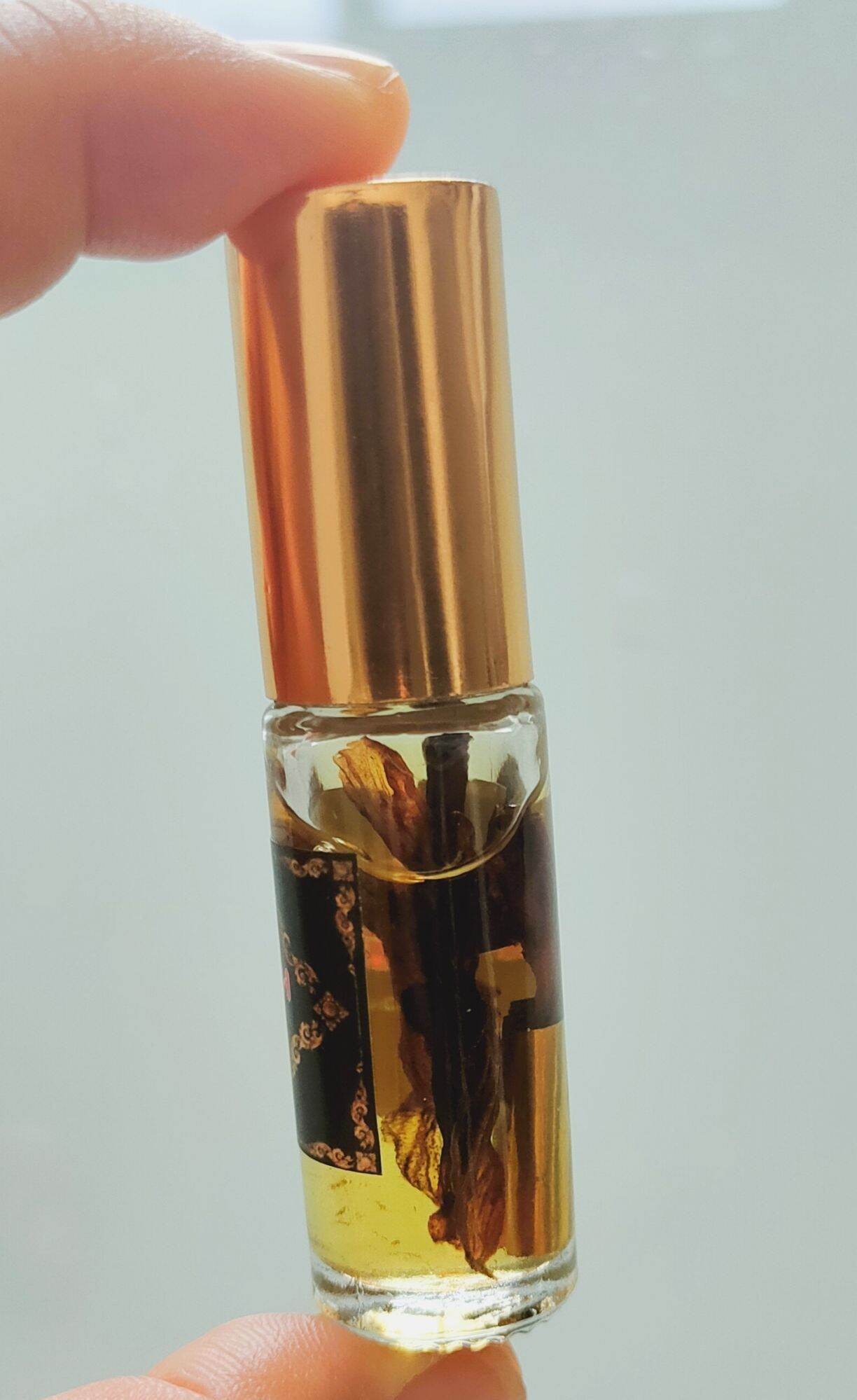 Golden Flower Oil – Seductive Prosperity Elixir By Luangta Ruam, Wat Khok Samran Temple, Phetchabun, Thailand 金色花油 • 魅力與財富兼具的祕法香油 - Thai Blessing Co