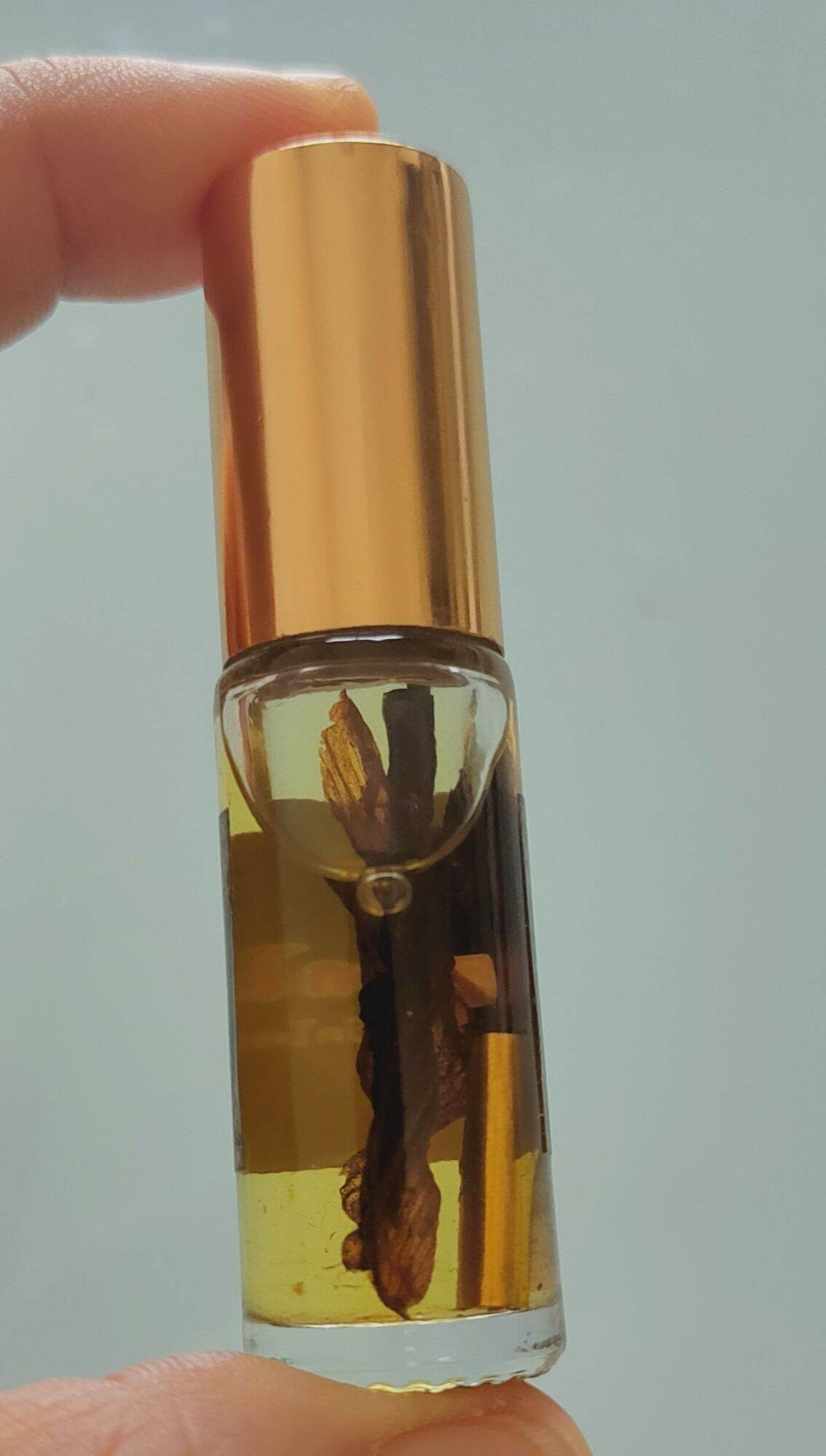 Golden Flower Oil – Seductive Prosperity Elixir By Luangta Ruam, Wat Khok Samran Temple, Phetchabun, Thailand 金色花油 • 魅力與財富兼具的祕法香油 - Thai Blessing Co
