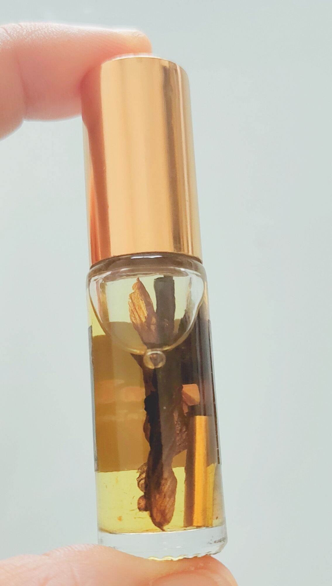 Golden Flower Oil – Seductive Prosperity Elixir By Luangta Ruam, Wat Khok Samran Temple, Phetchabun, Thailand 金色花油 • 魅力與財富兼具的祕法香油 - Thai Blessing Co