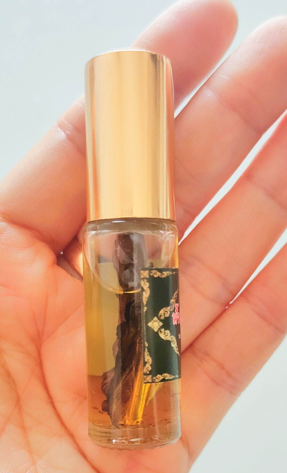 Golden Flower Oil – Seductive Prosperity Elixir By Luangta Ruam, Wat Khok Samran Temple, Phetchabun, Thailand 金色花油 • 魅力與財富兼具的祕法香油 - Thai Blessing Co