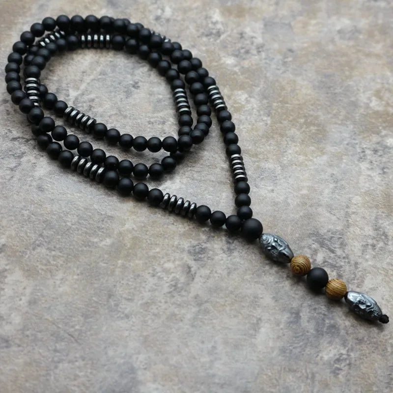 🗿 The "Ancestral Sage" Necklace: 6mm Hematite & Carved Tribal Elder Head Pendant (Wisdom & Protection)