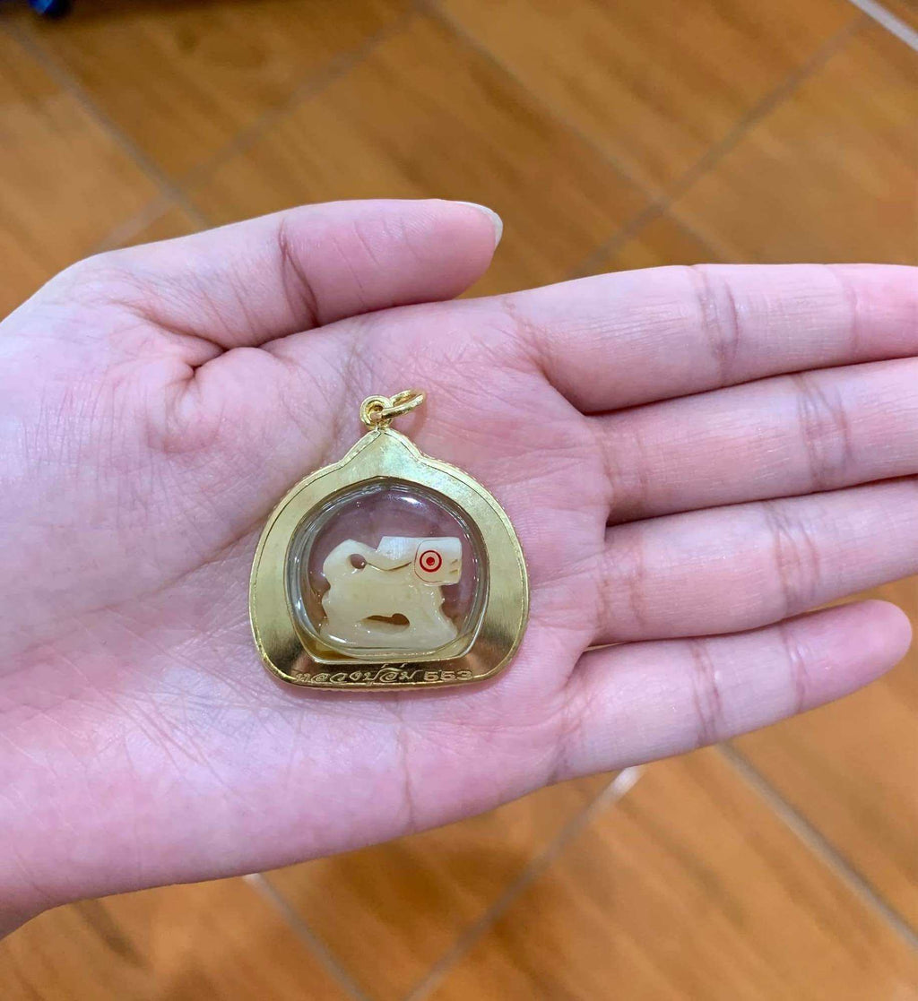 Carved Bone Singha Amulet with Musk Oil Coating – Blessed by Luang Pu Im, Wat Thung Na Mai, Nakhon Si Thammarat