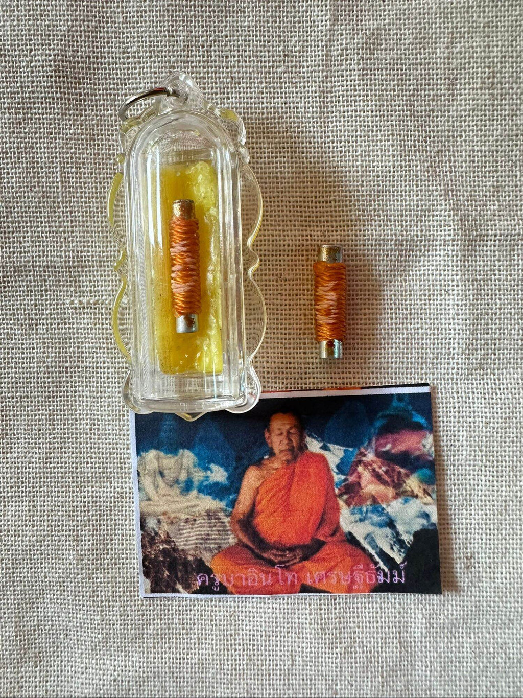 🪙 “Never‑Empty Fortune Takrut” – Wealth, Savings & Debt‑Release Talisman by Kruba Into (Framed with Chant Included)