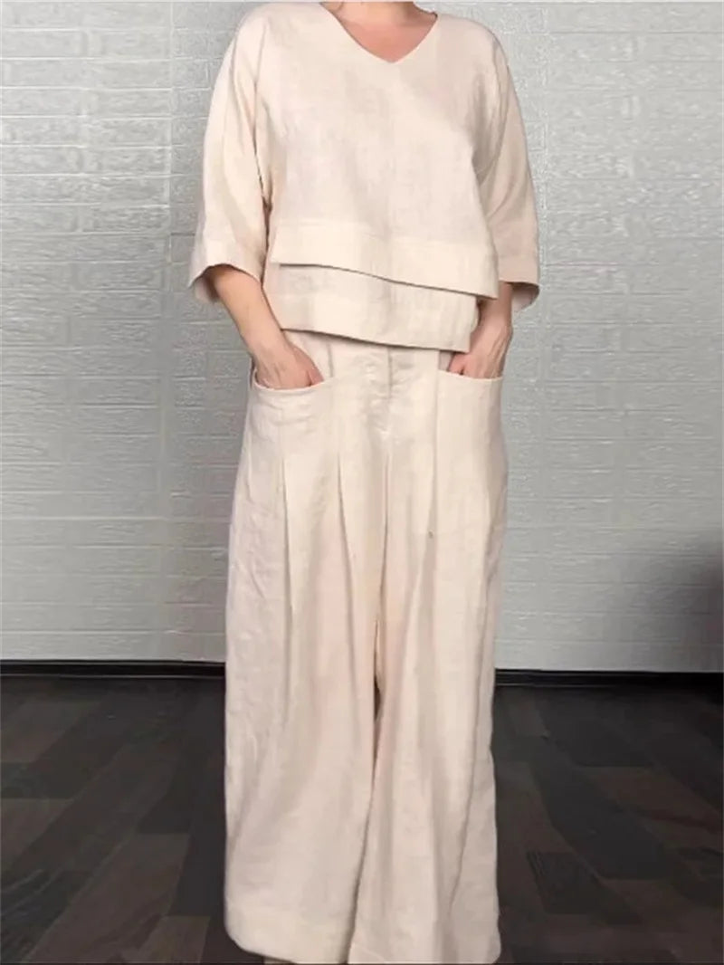🌿 The Ethereal Asymmetry Set: Premium Women’s 2-Piece Cotton-Linen Ensemble – Avant-Garde Asymmetric Tunic, Three-Quarter Sleeve Comfort, High-Waist Wide-Leg Trousers, and Sophisticated Breathable Summer Lounge Set (S-3XL) Apricot