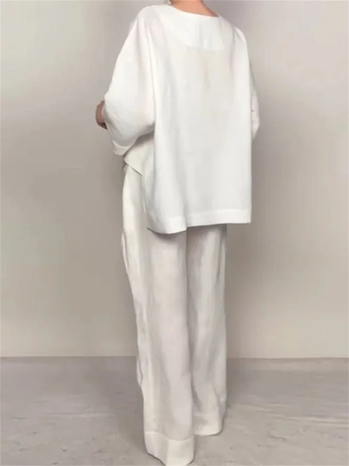 🌿 The Ethereal Asymmetry Set: Premium Women’s 2-Piece Cotton-Linen Ensemble – Avant-Garde Asymmetric Tunic, Three-Quarter Sleeve Comfort, High-Waist Wide-Leg Trousers, and Sophisticated Breathable Summer Lounge Set (S-3XL)
