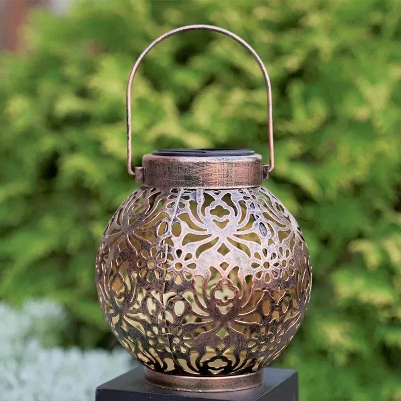 Solar LED Lantern with Hollow Wrought Iron Design – Waterproof Outdoor Hanging Projection Lamp for Garden and Yard Decor