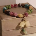 ✨ Tourmaline Crystal Bracelet – Light Luxury Orchid Pendant Beaded Jewelry for Women and Men – Perfect Gift for Elegance and Healing