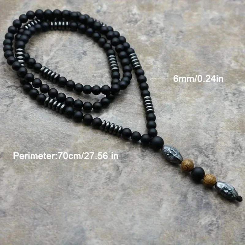 🗿 The "Ancestral Sage" Necklace: 6mm Hematite & Carved Tribal Elder Head Pendant (Wisdom & Protection)
