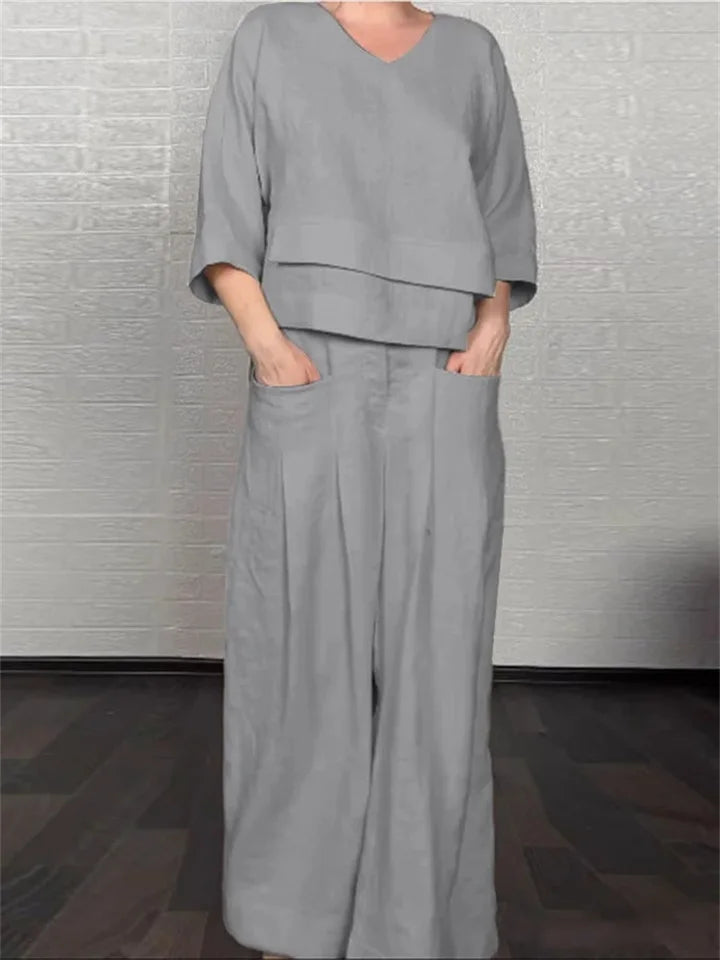 🌿 The Ethereal Asymmetry Set: Premium Women’s 2-Piece Cotton-Linen Ensemble – Avant-Garde Asymmetric Tunic, Three-Quarter Sleeve Comfort, High-Waist Wide-Leg Trousers, and Sophisticated Breathable Summer Lounge Set (S-3XL)