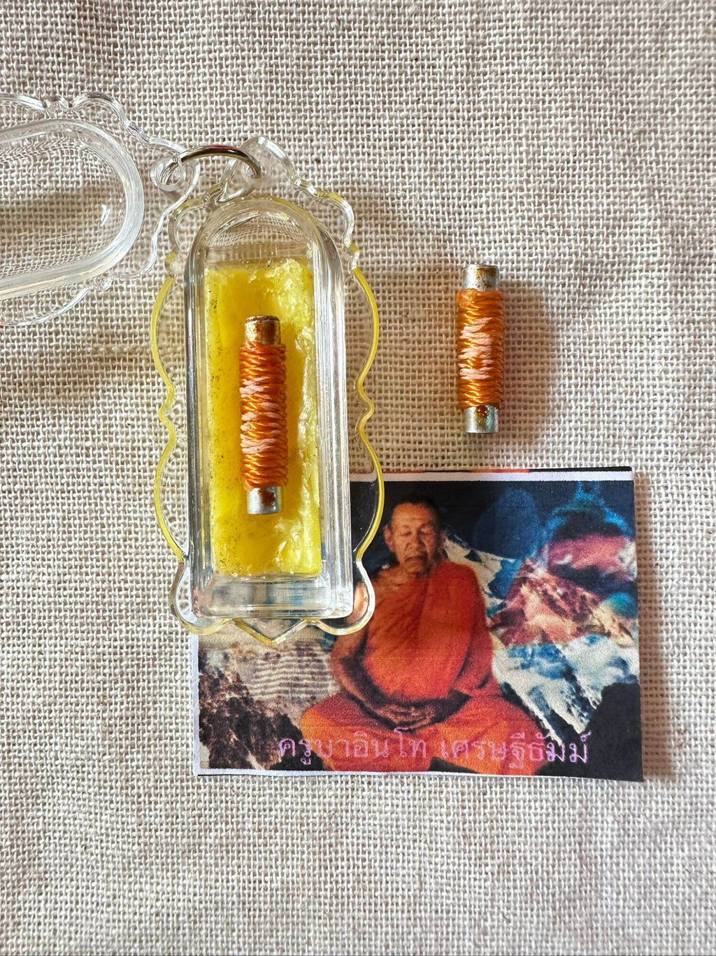 🪙 “Never‑Empty Fortune Takrut” – Wealth, Savings & Debt‑Release Talisman by Kruba Into (Framed with Chant Included)