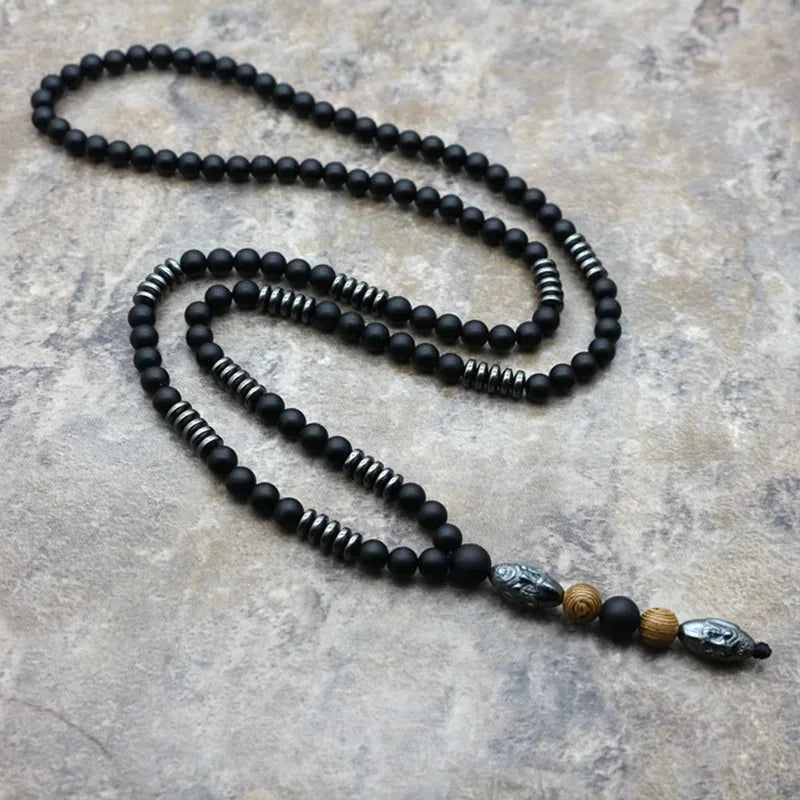🗿 The "Ancestral Sage" Necklace: 6mm Hematite & Carved Tribal Elder Head Pendant (Wisdom & Protection)