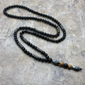 🗿 The "Ancestral Sage" Necklace: 6mm Hematite & Carved Tribal Elder Head Pendant (Wisdom & Protection)