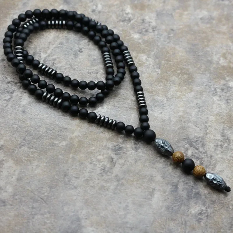 🗿 The "Ancestral Sage" Necklace: 6mm Hematite & Carved Tribal Elder Head Pendant (Wisdom & Protection)
