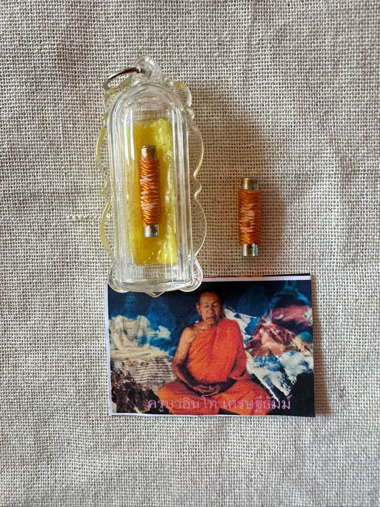 🪙 “Never‑Empty Fortune Takrut” – Wealth, Savings & Debt‑Release Talisman by Kruba Into (Framed with Chant Included)