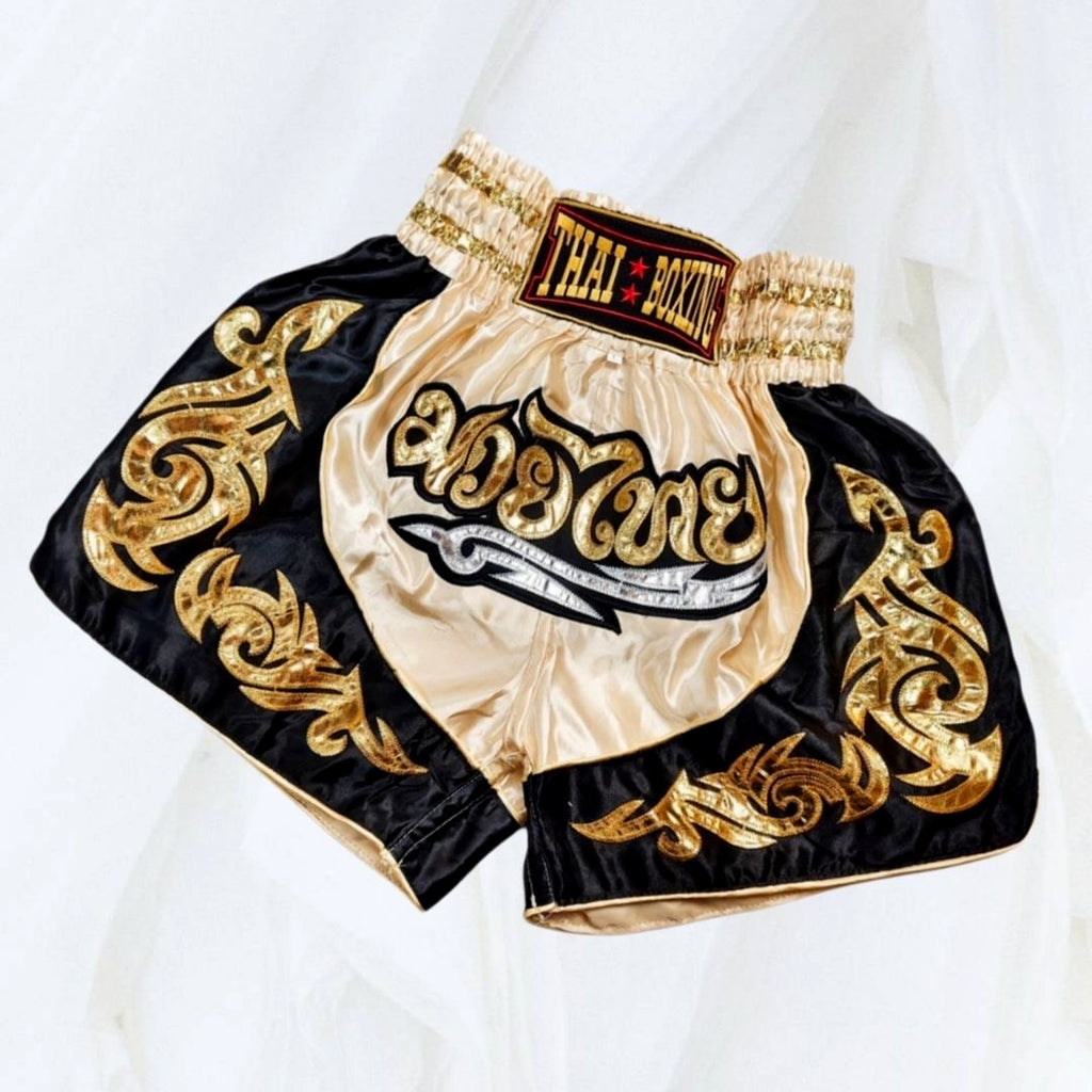 🥊The Warrior’s Glory: Authentic Premium Thai Pattern Muay Thai Shorts – Double-Layered Professional Satin Boxing Trunks, Handcrafted Factory-Direct Export Grade for Adults and Kids (Cream and black Muay Thai shorts)