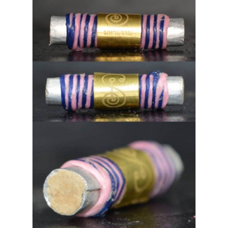 Small cylindrical akrut Maha Prap – Protective Amulet with gold engraved band wrapped in pink and blue cord