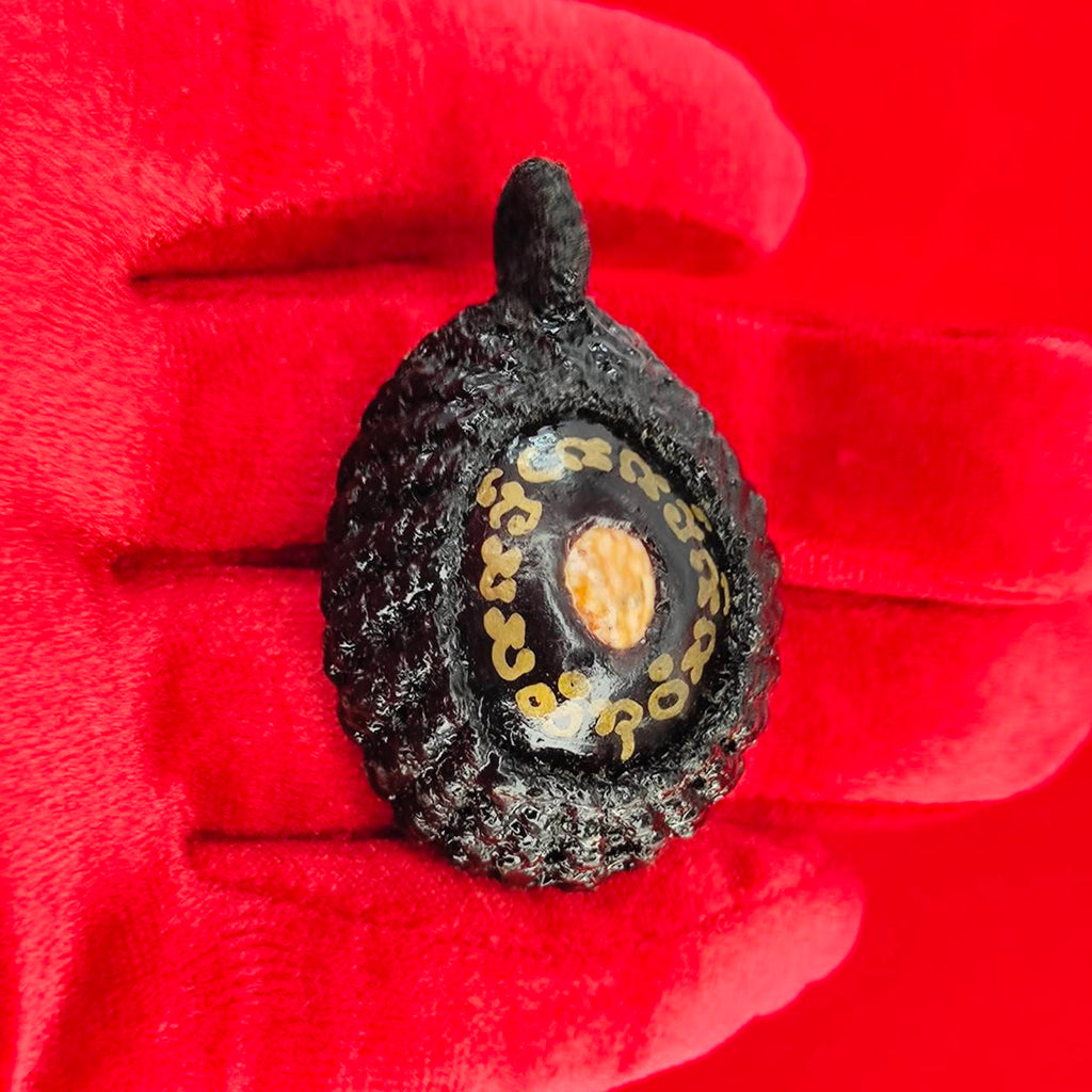 Handcrafted Bia Gae amulet for protection on display with intricate details and vibrant colors