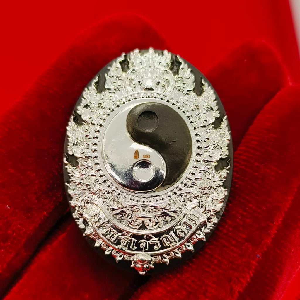 Rahu amulet coin for prosperity featuring intricate design and dual symbolism for good fortune