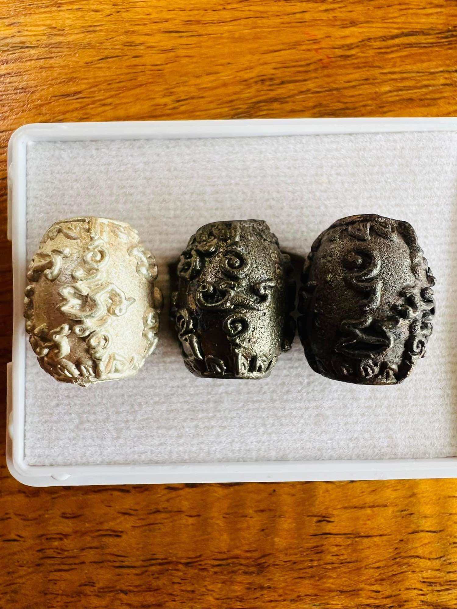 Thai Blessing Co three metallic carved amulet beads in gold silver and bronze negative energy protection charm