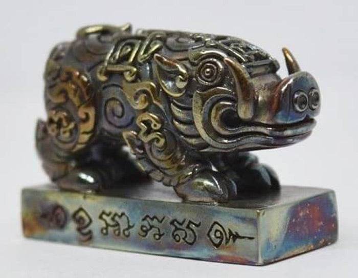 Phaya Moo Setthi bronze pig amulet statue with intricate Thai engravings on rectangular base for home feng shui