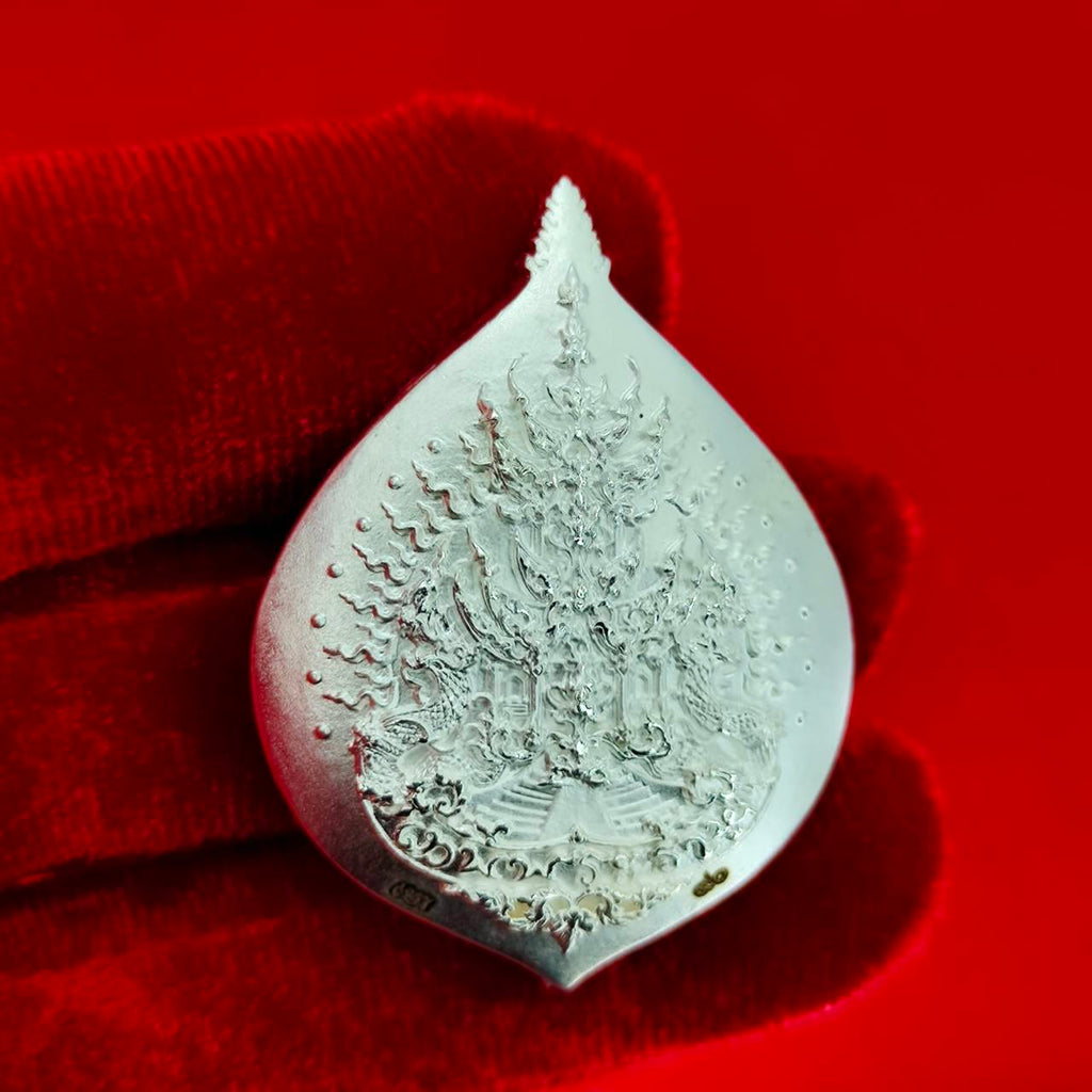 Rahu amulet for fortune crafted in silver with intricate designs for enhanced luck and blessings