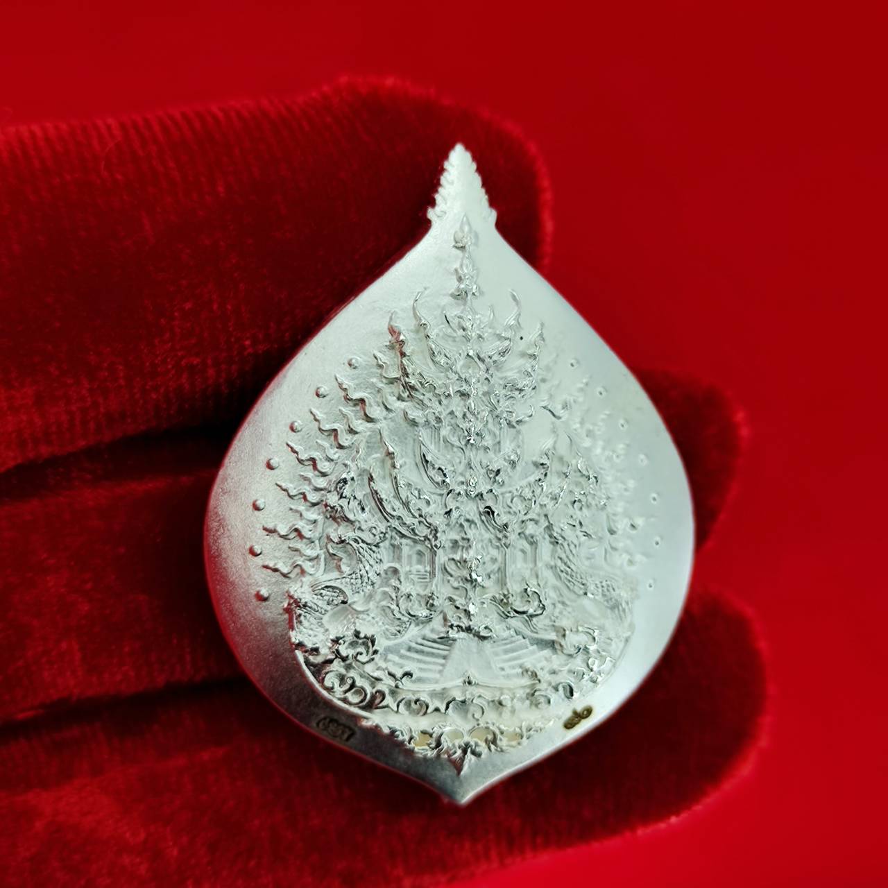 Rahu amulet for fortune crafted in silver with intricate designs for enhanced luck and blessings