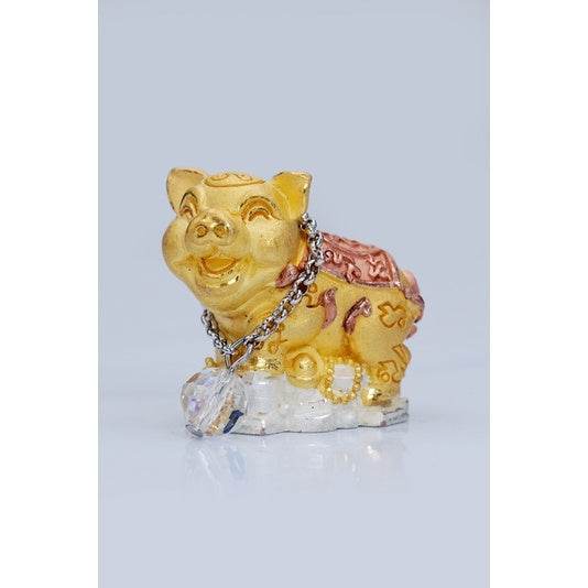 Golden smiling pig figurine with crystal pendant on base Thai lucky prosperity pig collectible for feng shui