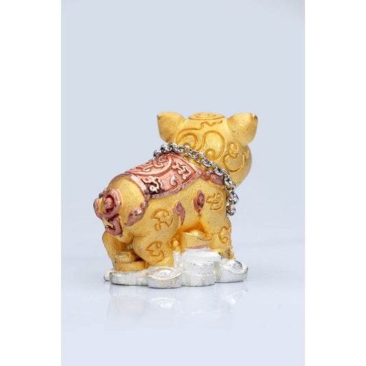Thai lucky prosperity pig collectible gold statue with engraved patterns and silver chain standing on coins