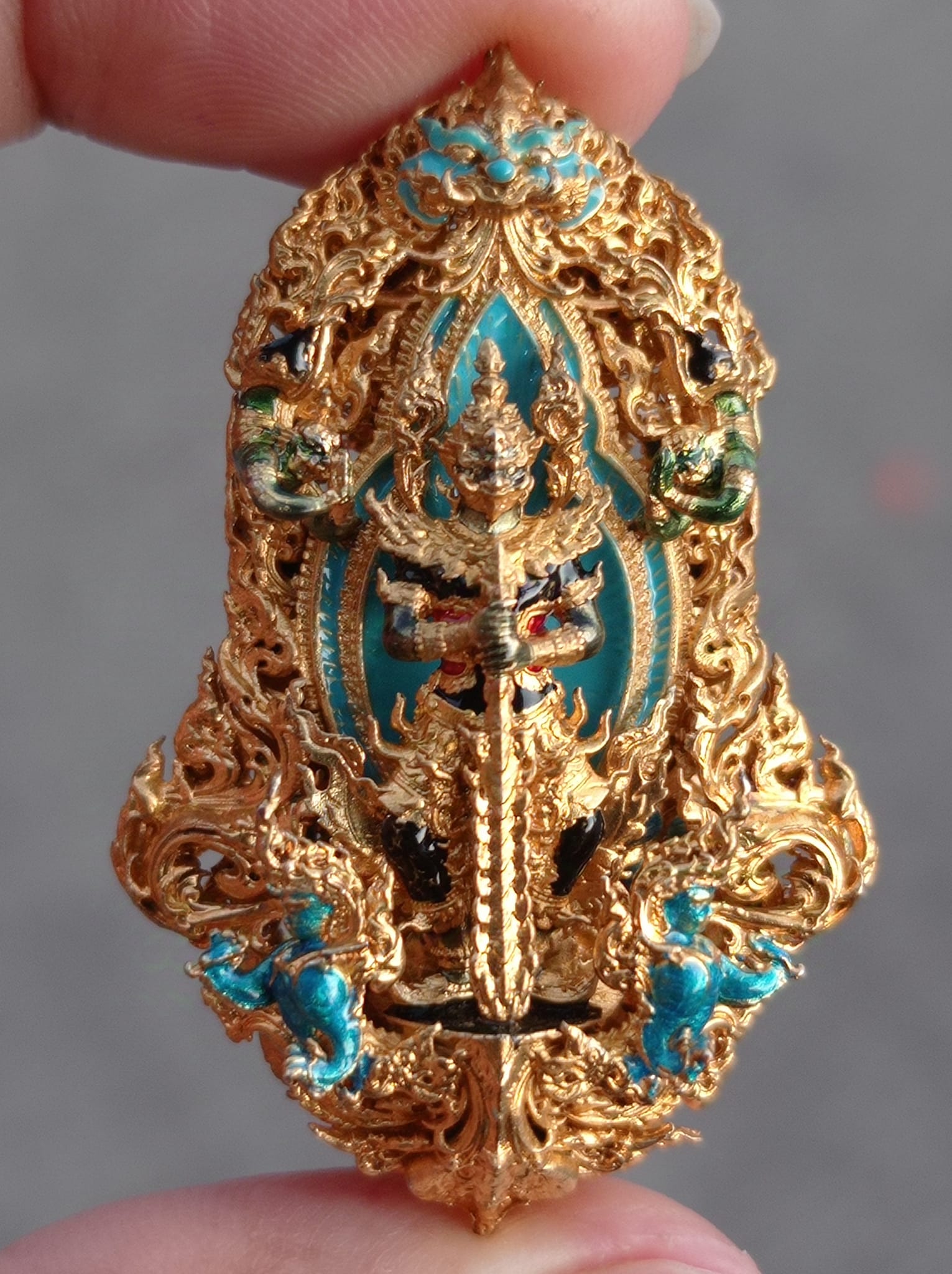 Thai Blessing Co Thao Wessuwan amulet for protection with intricate gold and turquoise detailing