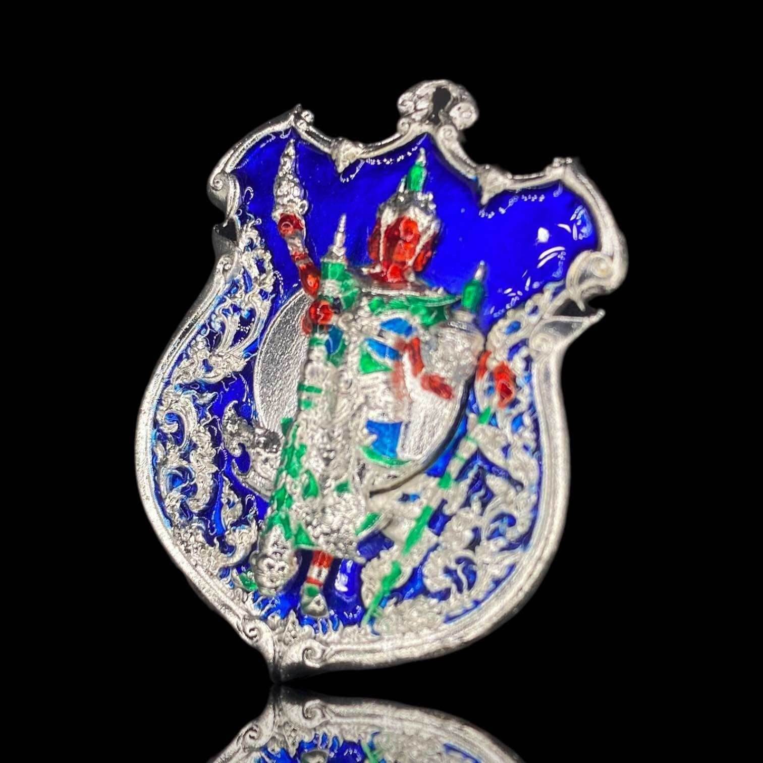 Silver enamel Thai guardian amulet with blue background depicting Thao Wessuwanno Sodaprom in ornate detail
