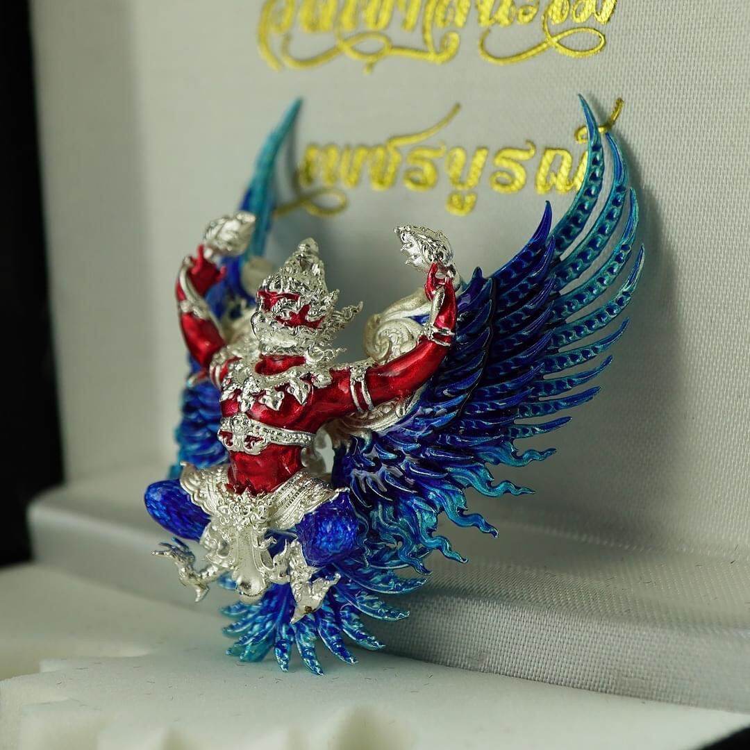 Phaya Krut Sataphusay Amulet ornate silver red and blue Garuda figurine with detailed wings in display box