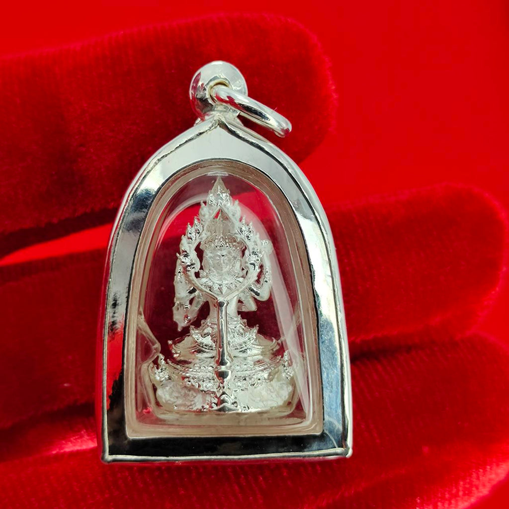 Brahma Naga amulet with silver frame pendant in clear case on red velvet detailed deity and naga design