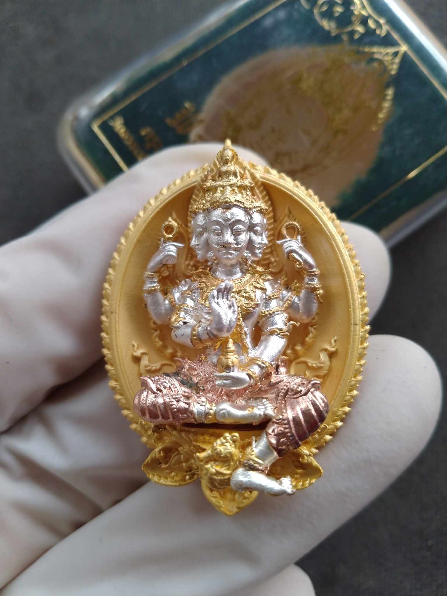 Thai Blessing Co Phrom Setthi blessed coin amulet gold and silver plated multi face Brahma pendant in ornate oval frame
