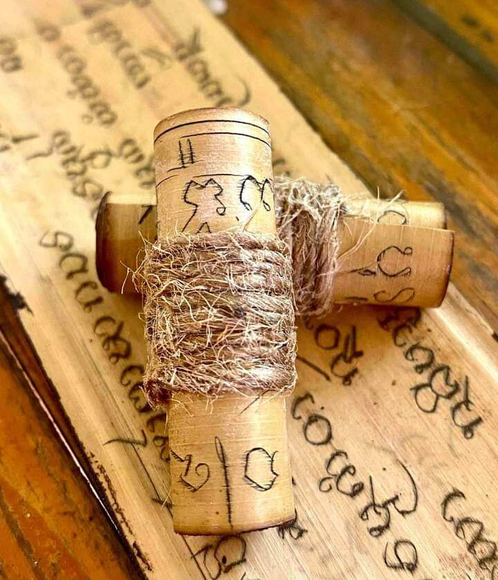 Thai Blessing Co wooden sacred protection charm for fortune cross pendant wrapped in hemp twine with sacred script