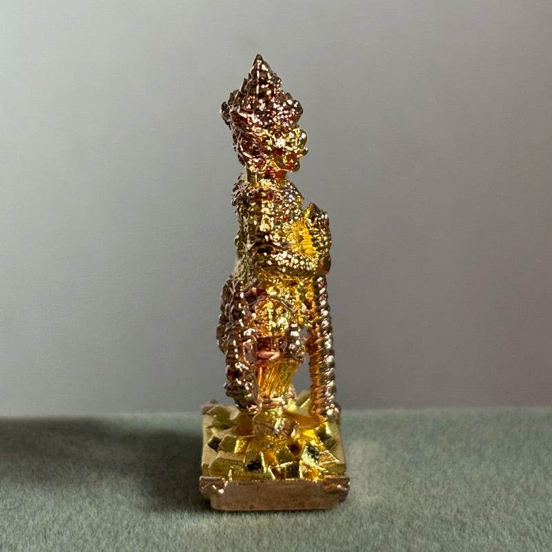 Thao Wessuwan amulet limited edition gold guardian statue standing on decorative base Thai Blessing Co