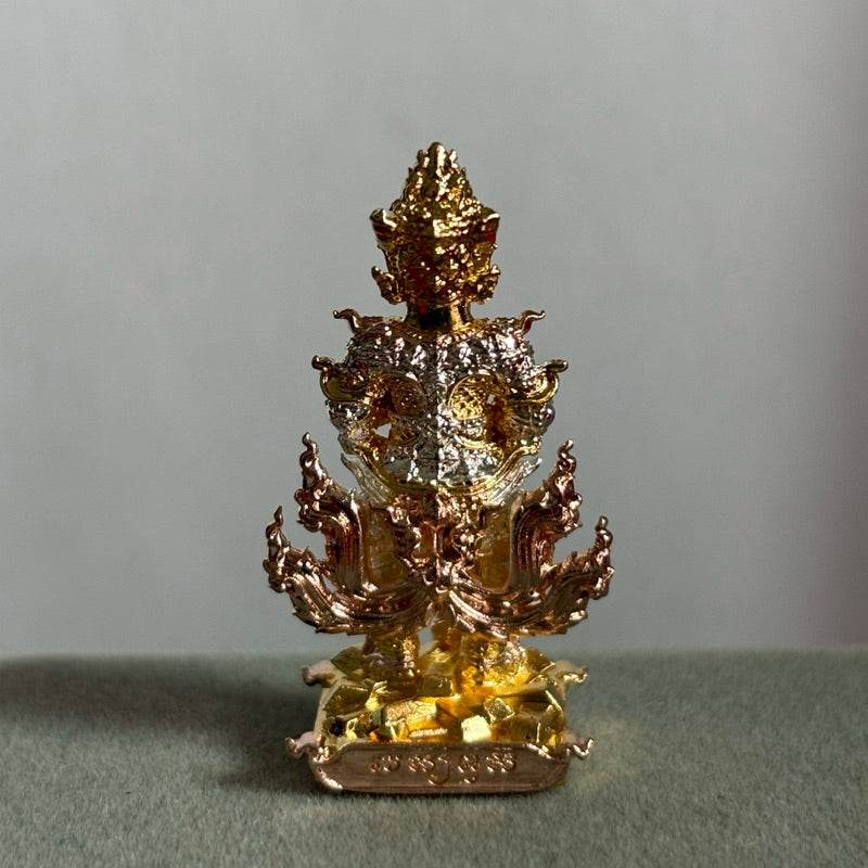 Thai Blessing Co gold plated Thao Wessuwan amulet Wat Suthat statue with ornate flame motifs on pedestal
