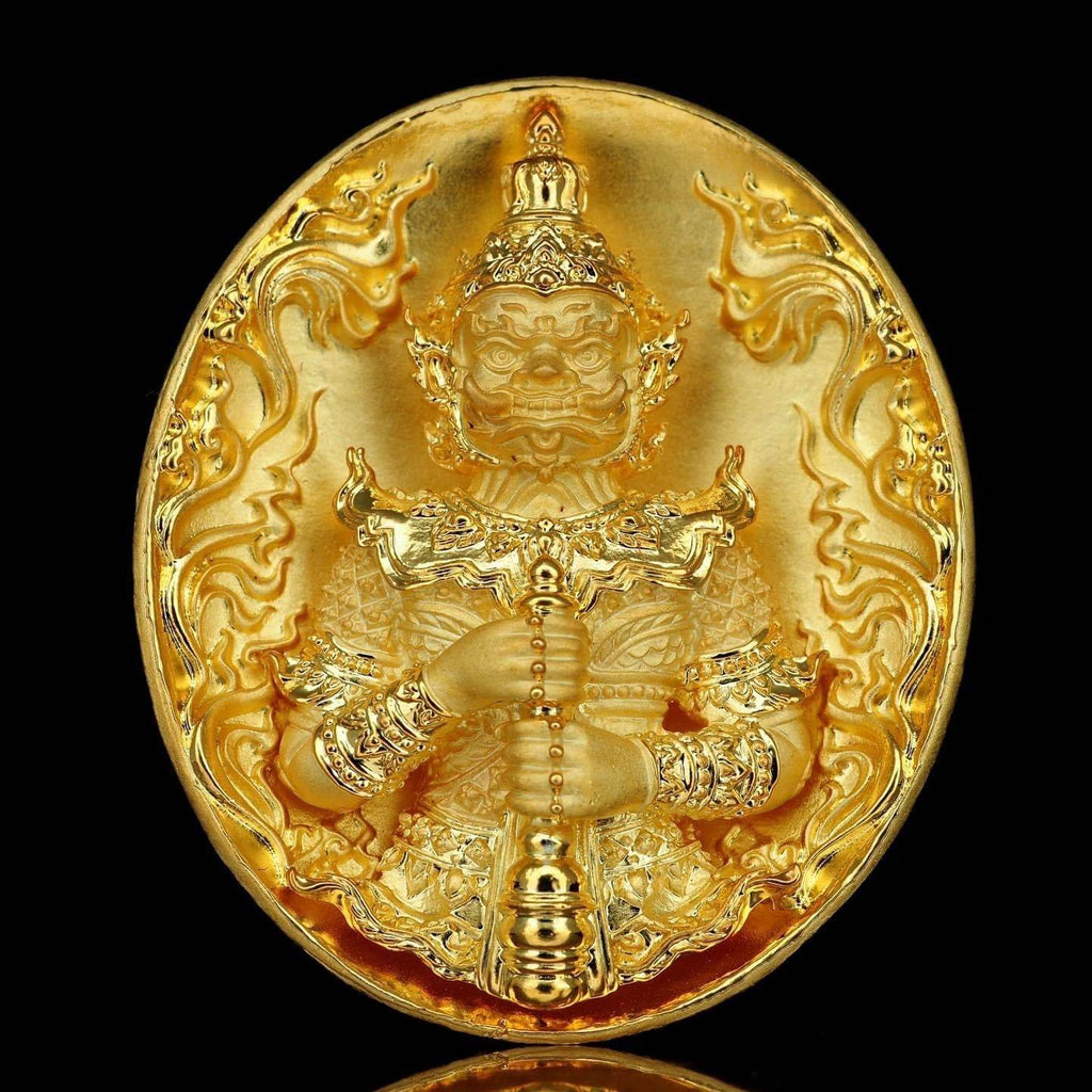 Gold oval amulet medallion featuring guardian figure holding staff with ornate details Thao Wessuwanno Bandarn Patthanapon