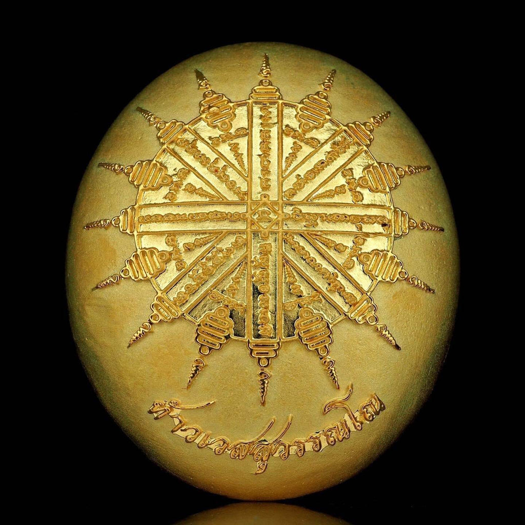 Gold oval amulet medallion with intricate sacred star emblem and Thai script, Thao Wessuwanno Bandarn Patthanapon