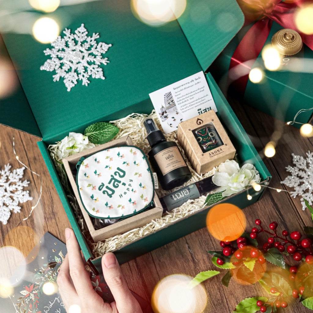 One-Sake.com aromatic wellness gift set with essential oil spray, soap, and decorative packaging in green box