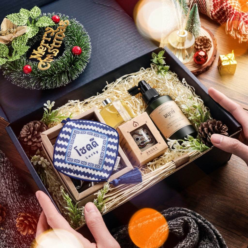 Christmas aromatherapy gift set by One-Sake.com with essential oils and festive packaging in a holiday box