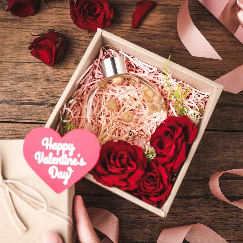 Customizable Valentine's Day gift set with red roses and decorative bottle in a gift box