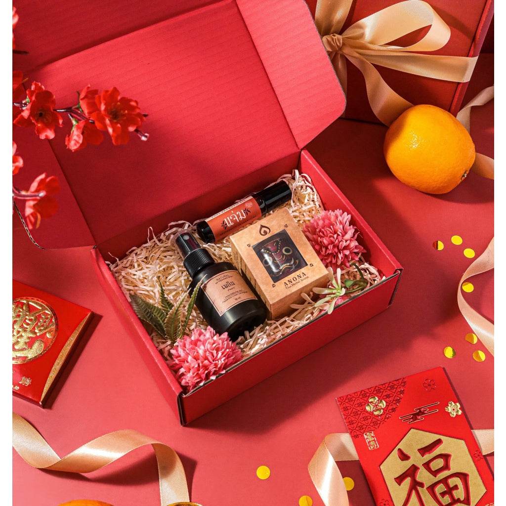 One-Sake.com essential oil roll-on bundle gift set with spray, roll-on, and box in red packaging