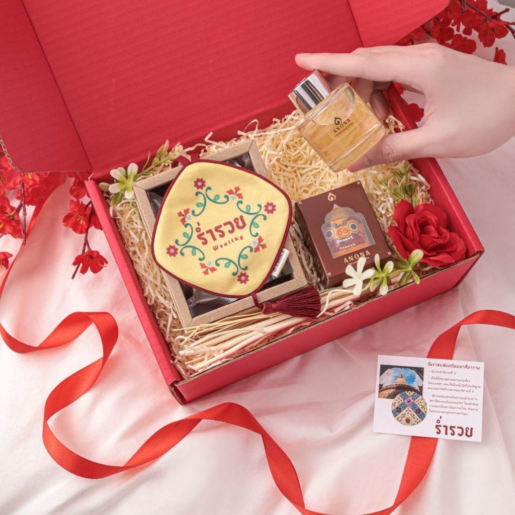 One-Sake.com lucky red aroma gift box with perfume bottle, decorative incense sticks, and floral accents